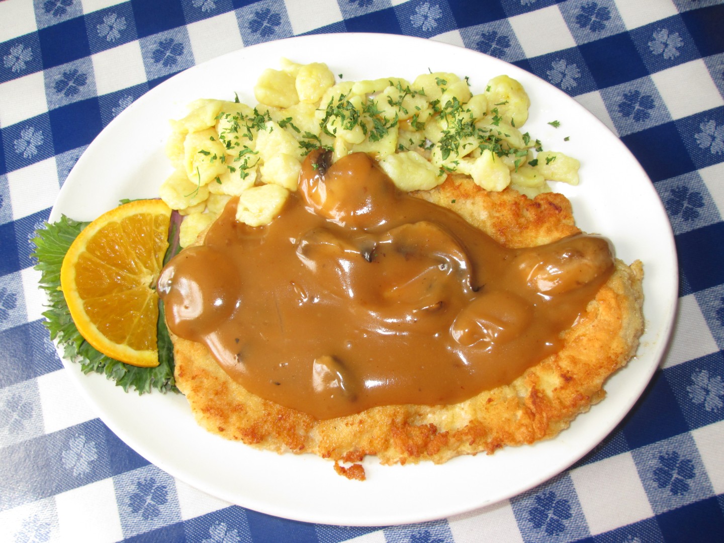 Ox Yoke Inn signature dishes Catfish, Sunday Brunch, Westphalian Chicken Schnitzel, Coleslaw.